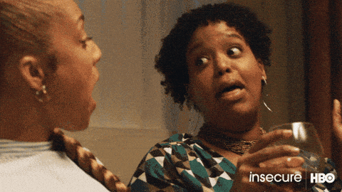 a gif of two people laughing