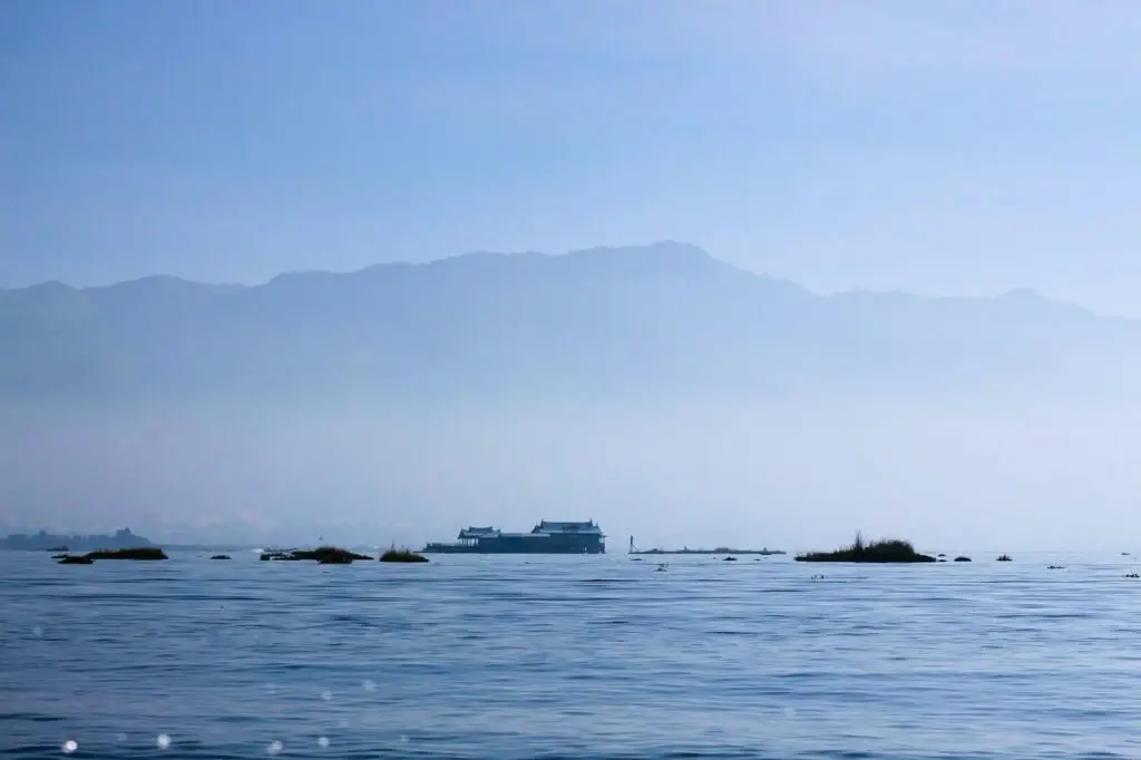 white ship on sea during daytime