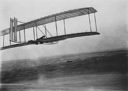 Image credit: https://diplycom5cc47.zapwp.com/q:i/r:0/wp:1/w:1/u:https://commons.wikimedia.org/wiki/File:1903_Wright_Flyer.jpg