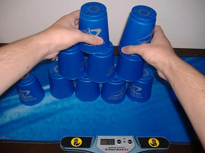Image credit: https://diplycom5cc47.zapwp.com/q:i/r:0/wp:1/w:1/u:https://commons.wikimedia.org/wiki/File:Sport-Stacking.jpg