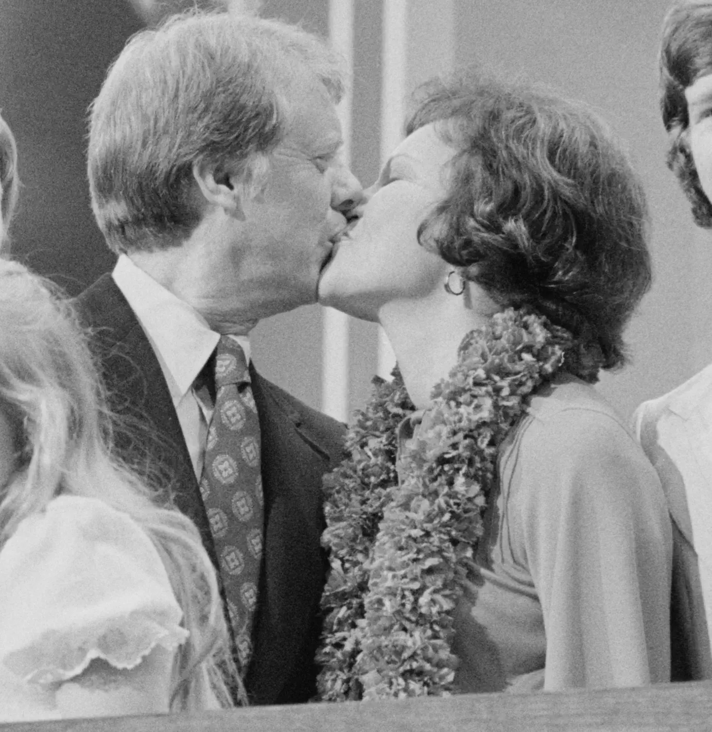 Image credit: https://diplycom5cc47.zapwp.com/q:i/r:0/wp:1/w:1/u:https://commons.wikimedia.org/wiki/File:Jimmy_and_Rosalynn_Carter_kissing_at_the_Democratic_National_Convention,_New_York_City.jpg